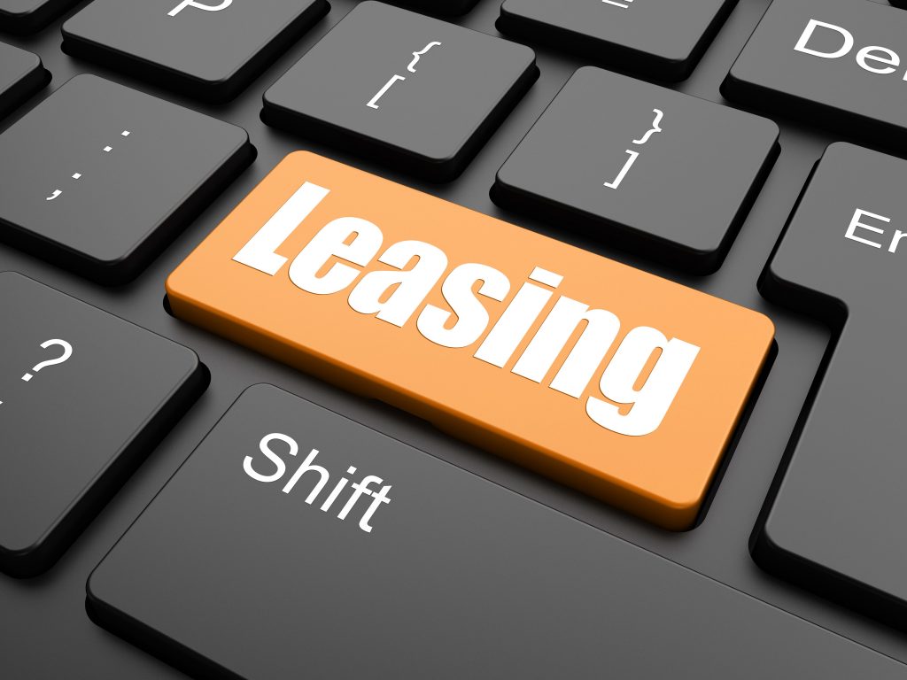 Orange Leasing button on a black keyboard - Equipment Finance Lease Information from Kennet Leasing